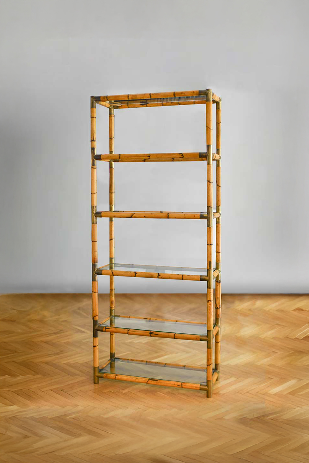 Bamboo bookcase with brass details