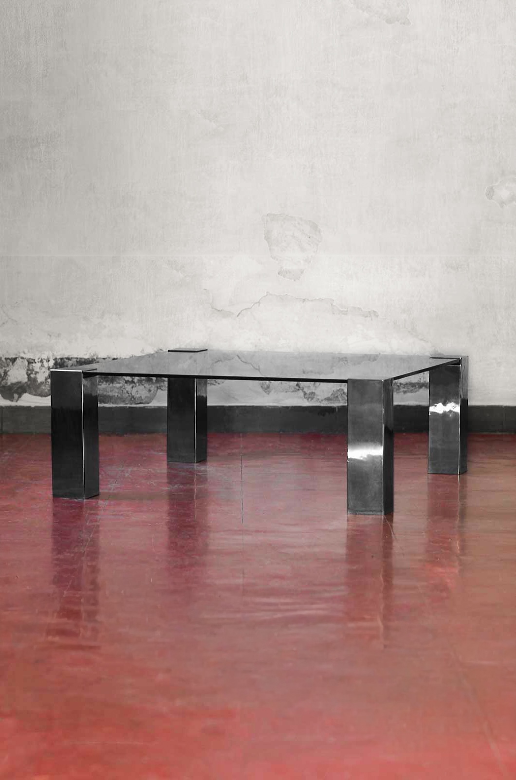 Chromed metal and dark glass coffee table